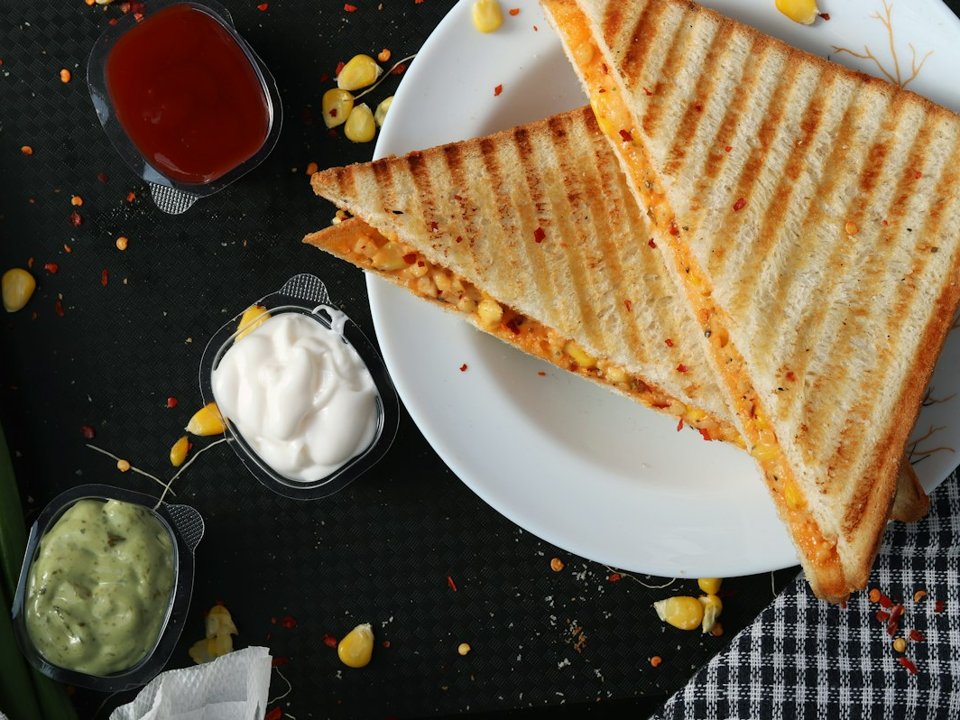 Grilled sandwich with cheese and corn